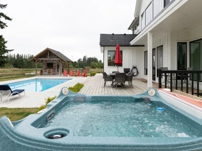 Pool with an attached hot tub