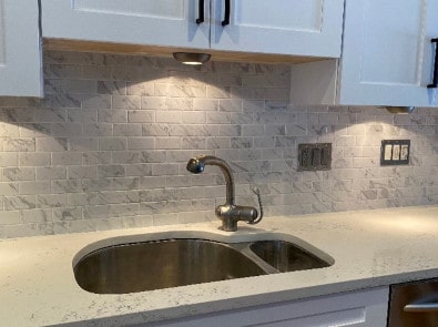 Under cabinet lights installed by an electrician in Loganville